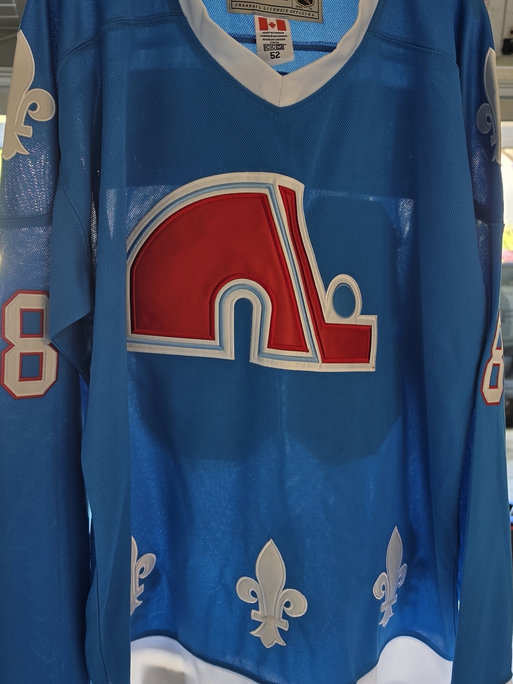 CCM Blue and White Hockey Jersey with Red Logo Accents